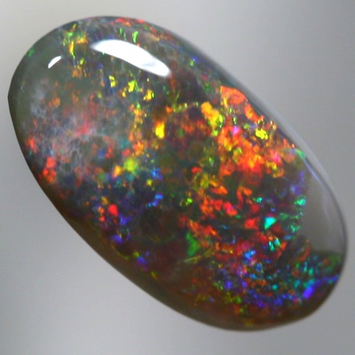 SOLID BLACK OPAL Bright sparkling fire red and copper orange